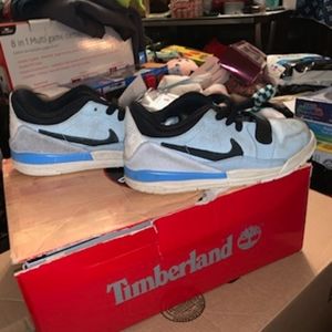 Kids blue black and gray nikes